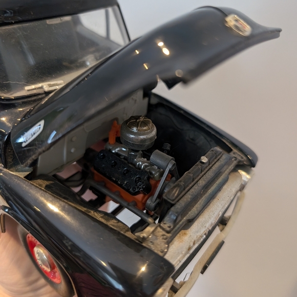 Classic Black Toy Truck with Red Wheels - Picture 8 of 11